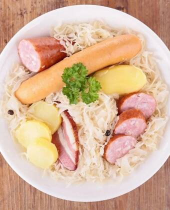 Taste authentic Alsatian cuisine prepared with regional ingredients in a warm atmosphere.